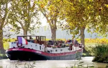 Superbe péniche navigante 120 m² à vendre sur le Canal du Midi