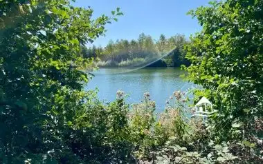 Péniche navigante à vendre avec étang privatif sur 4,34 hectares