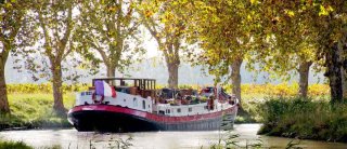 Superbe péniche navigante 120 m² à vendre sur le Canal du Midi