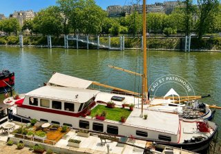 Péniche à vendre Paris 15 – Navigante et Agencement Optimal